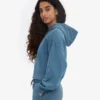 Ekologisk kort hoodie med dragkedja – blekt indigo