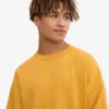 Ekologisk oversized-tröja – bränd gul