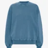 Ekologisk oversized-tröja med rund hals – blekt indigo
