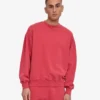 Ekologisk oversized-tröja med rund hals – blekt rött