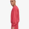 Ekologisk oversized-tröja med rund hals – blekt rött