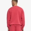 Ekologisk oversized-tröja med rund hals – blekt rött