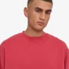 Ekologisk oversized-tröja med rund hals – blekt rött