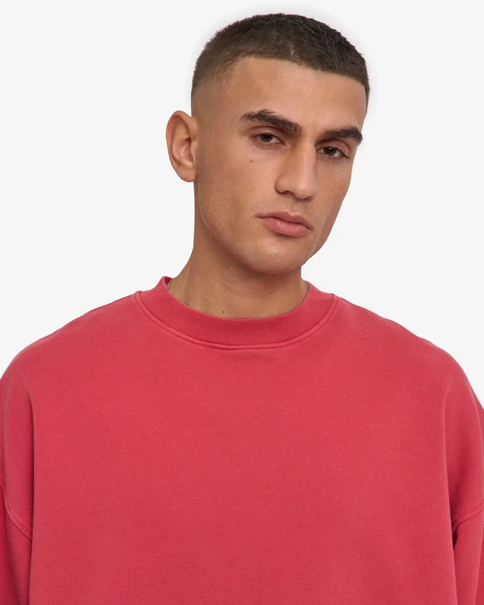 Ekologisk oversized-tröja med rund hals – blekt rött