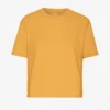 Ekologisk T-shirt med boxig, kort passform – bränd gul