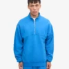Ekologisk tröja med kort dragkedja – Pacific Blue