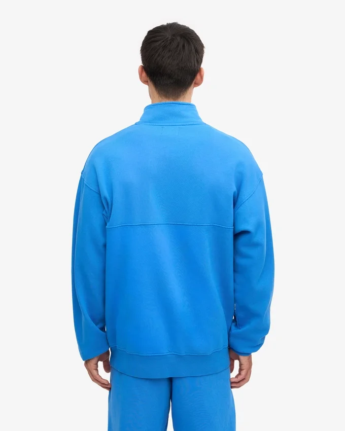 Ekologisk tröja med kort dragkedja – Pacific Blue