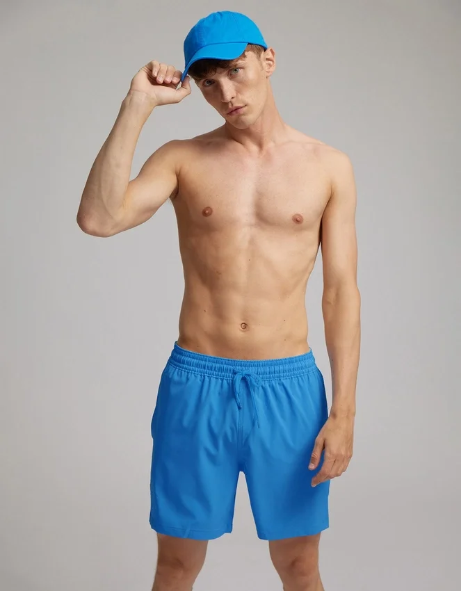 Klassiska badshorts – ljus korall