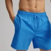 Klassiska badshorts – ljus korall