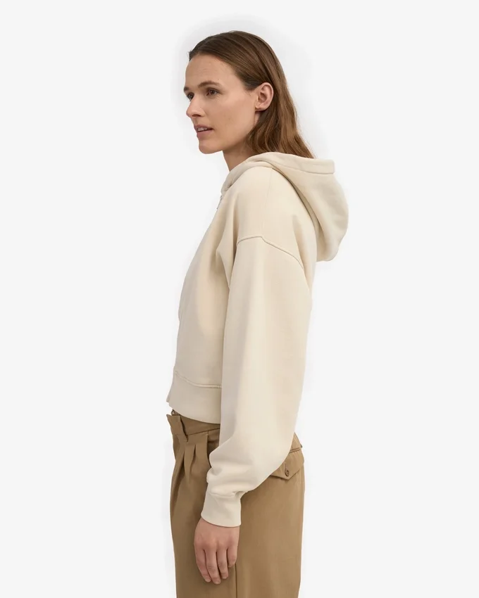 Kort hoodie i ekologiskt tyg med dragkedja – elfenbensvit