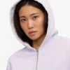 Kort hoodie i ekologiskt tyg med dragkedja – mjuk lavendel